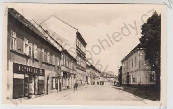  - Podbořany (Louny), Třída maršála Stalina, pohled ulicí, obchod, potraviny, reklama